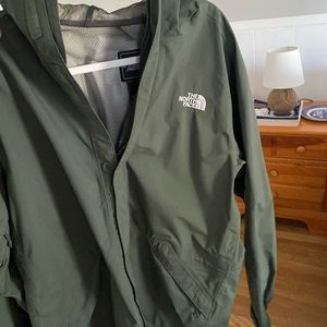Men’s green rain jacket from Northface